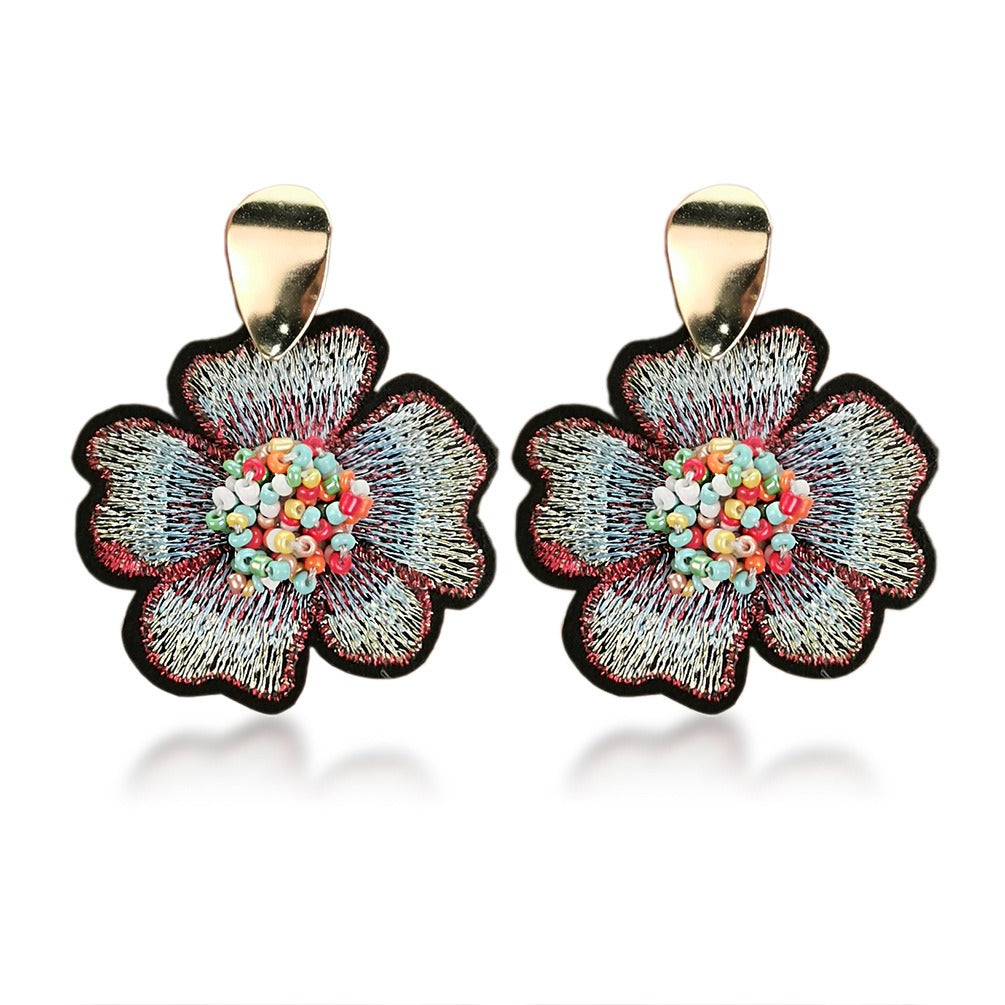 Japanese and Korean ins fashion all-match earrings female round rice bead flower pendant alloy earrings